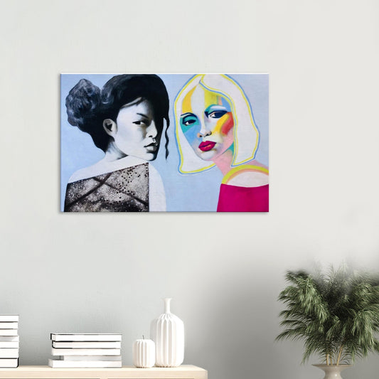 Modern wall art painting of two women, one in grayscale and the other in vibrant colors, displayed in a minimalist room